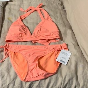Athleta Bathing Sute in Coral or Orange Sherbet.